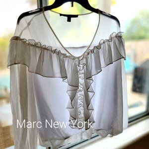 White long sleeve top with ruffle design off the shoulder